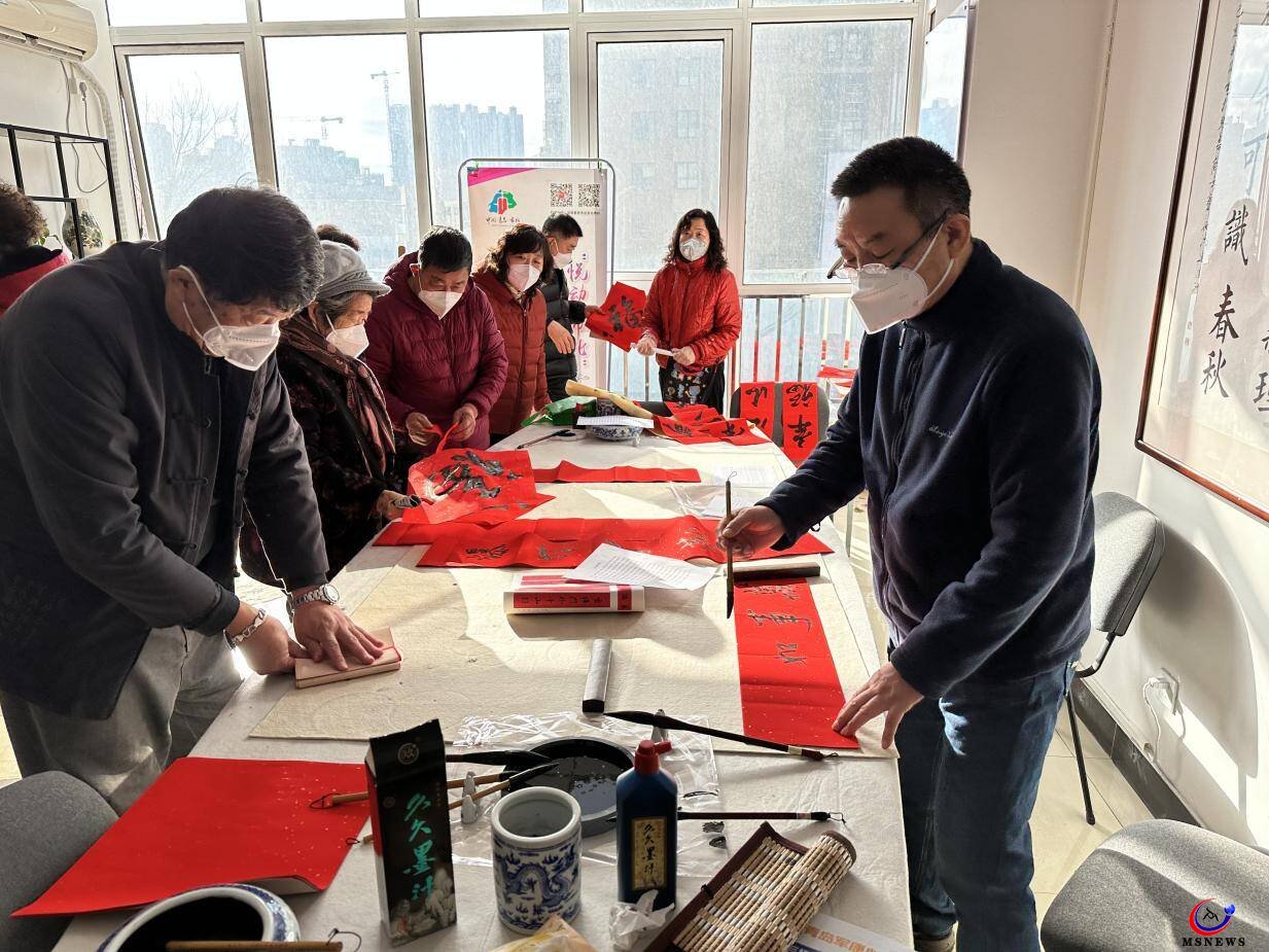 市北區(qū)大港街道開展“翰墨飄香迎新春”寫福送?；顒?dòng)